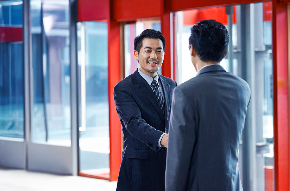 Asian-Business-Shake-Hands