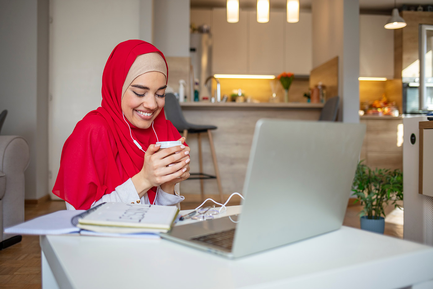 Middle Eastern woman with a laptop