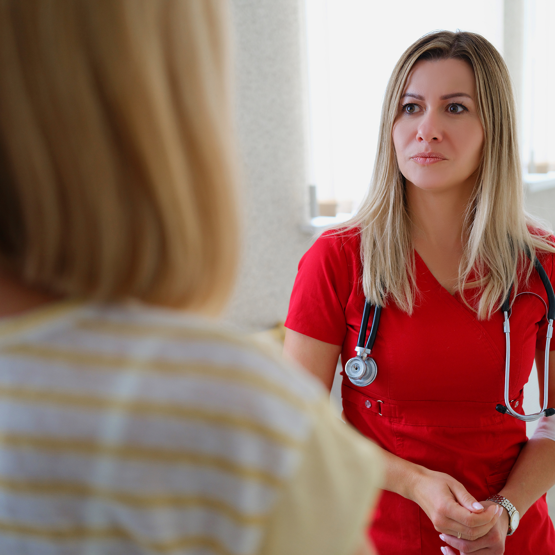 Nurse talking with a woman