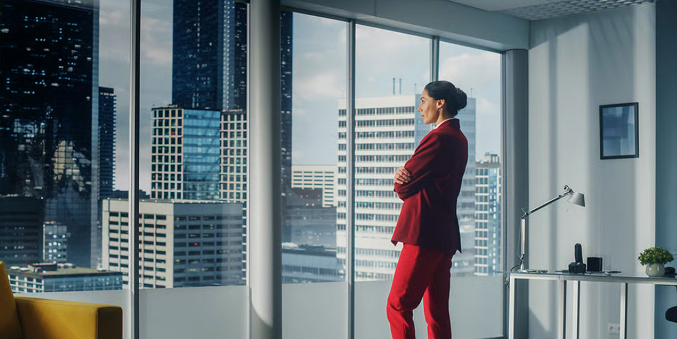 Woman standing at a window