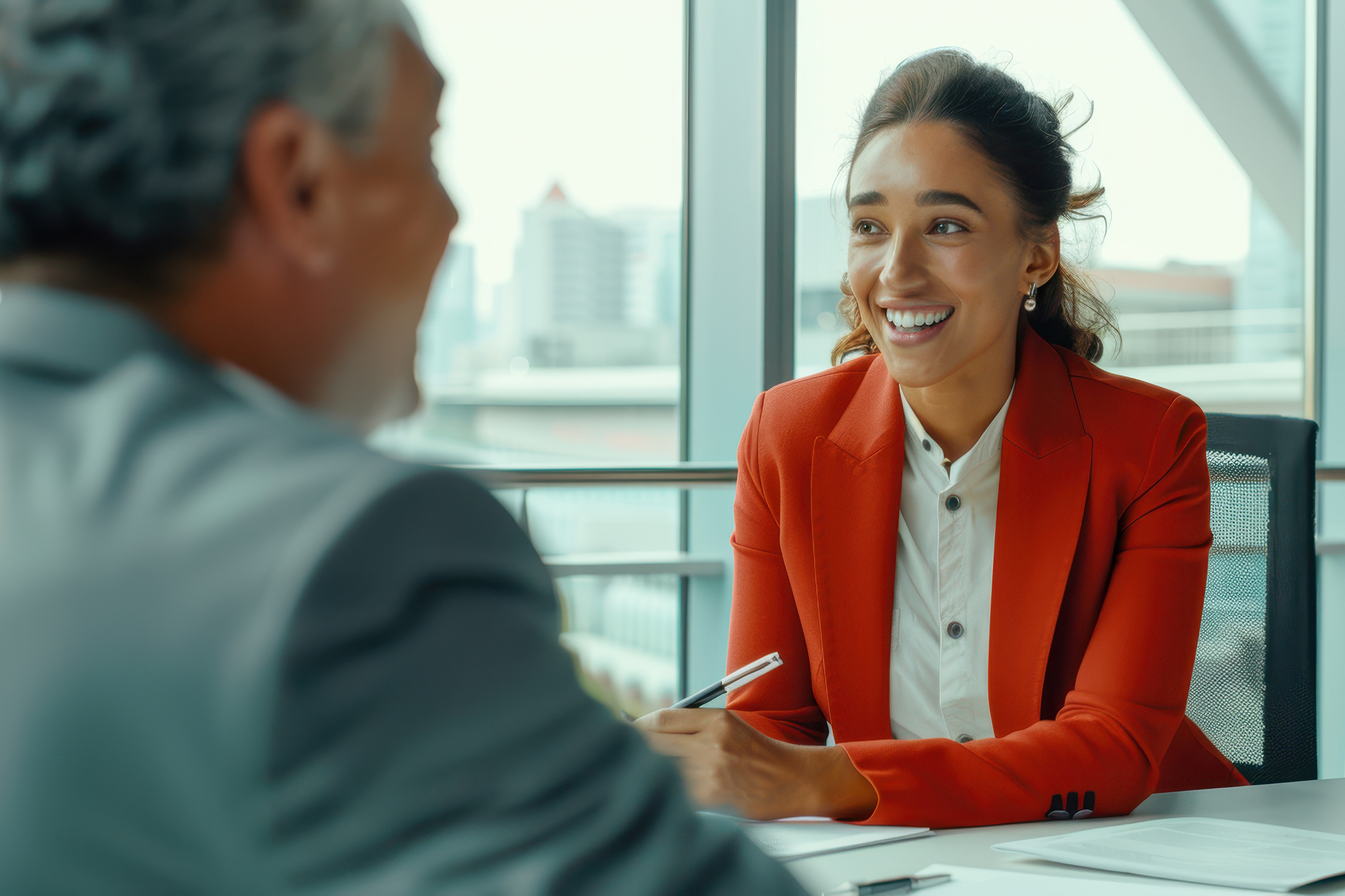 Woman talking with a man about an insurance partnership