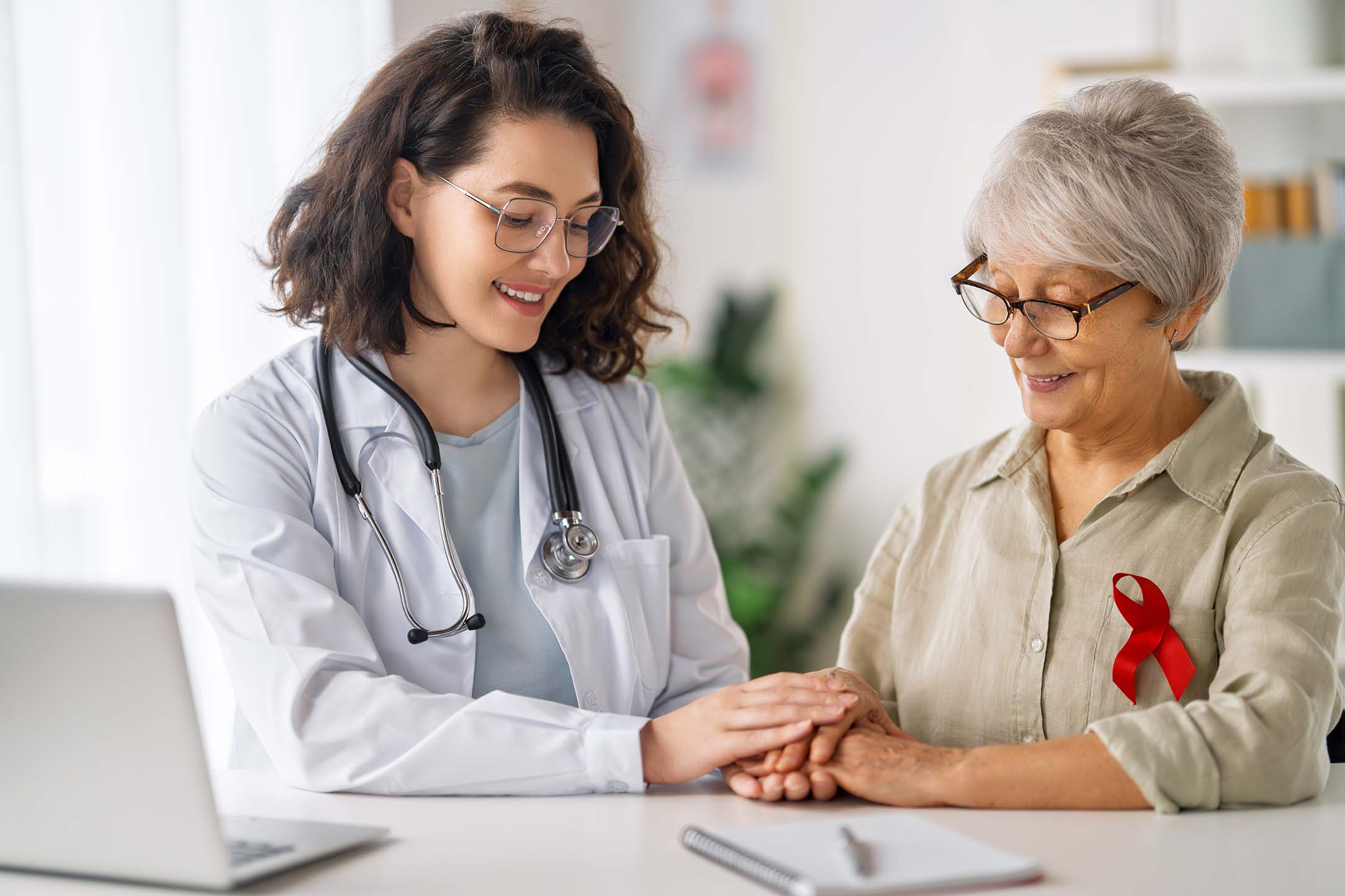 Doctor with woman cancer patient