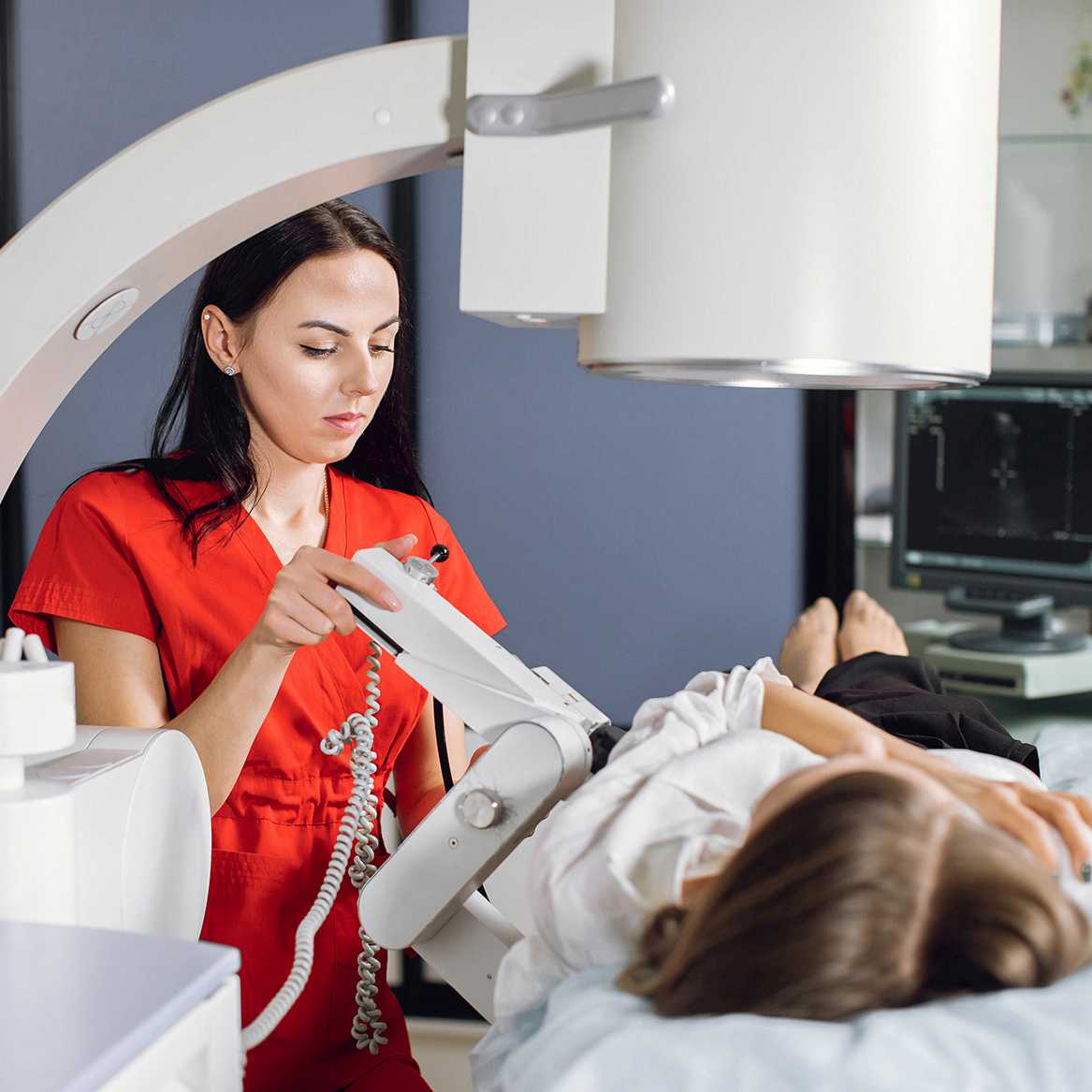 Nurse giving woman a scan