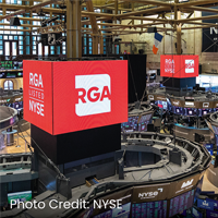 NYSE floor with RGA logos