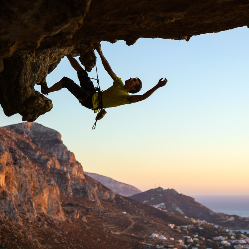 Man doing extreme rock climbing.